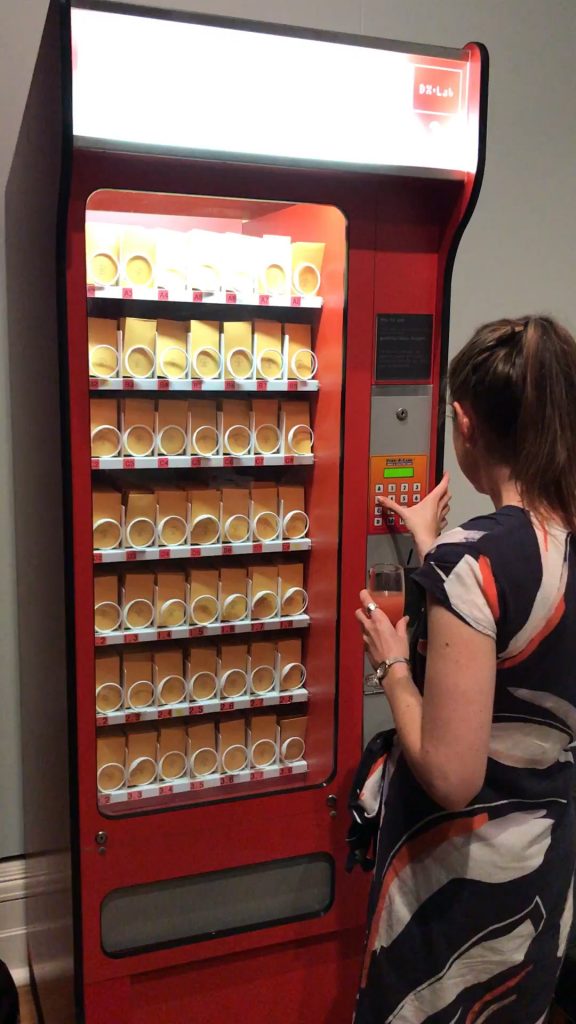 Curator Anna Corkhill using the Vending Library at Spark Festival